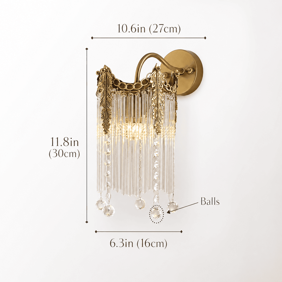 Gold wall sconce with clear tapered crystal prisms, shown with dimension labels