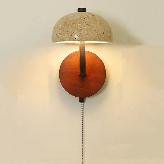 A modern mushroom-shaped wall sconce