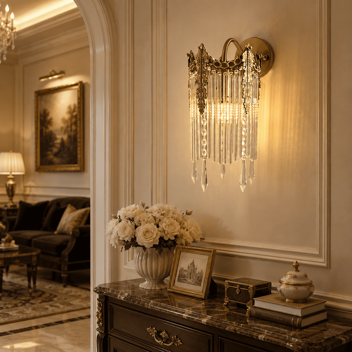 Wall sconce with hanging clear crystal prisms, mounted on a cream paneled wall 