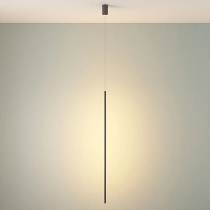 A minimalist linear pendant light with a slim dark metal rod suspended from a ceiling