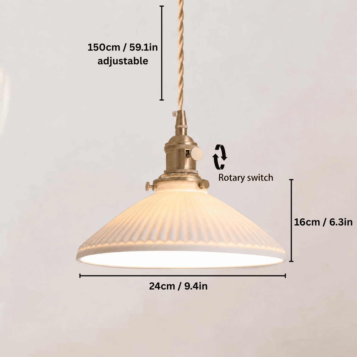 A hanging pendant light with a ribbed white glass shade and brass-toned metal fixture, shown with overlaid dimension labels